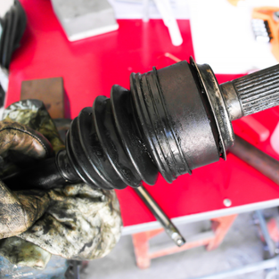 Car making clicking noise when turning due to worn CV axle